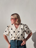Vanilla & Black Polka Dot Ruffle Top